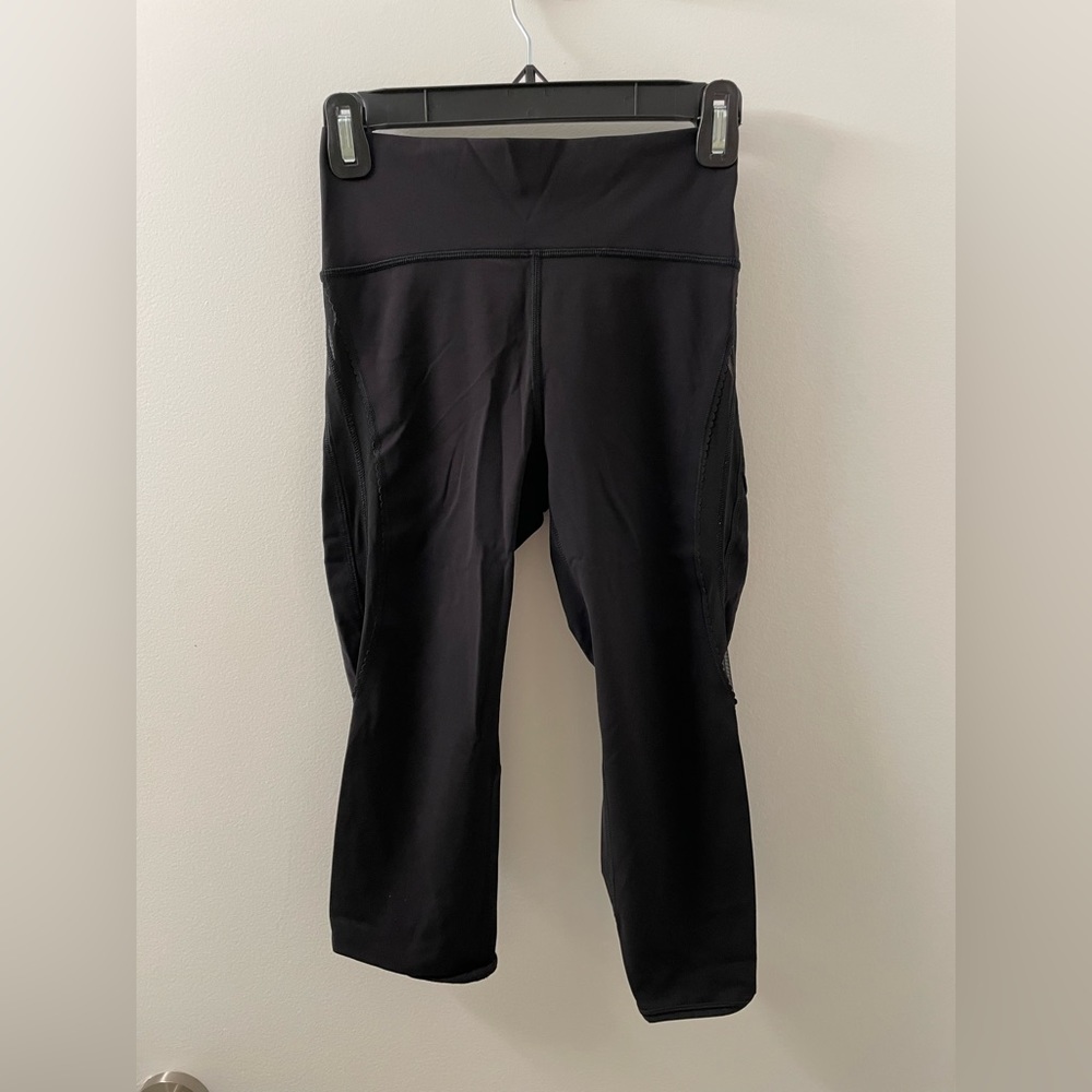 Lululemon 25 inch black leggings with sheer striped sides